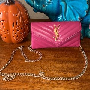 Yves Saint Laurent clutch with chain